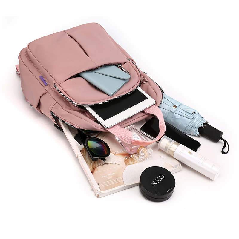 Water-Resistant Anti-Theft Backpack with USB Charging Port & Multi-Compartment Design